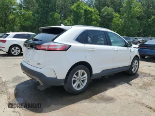 2020 Ford Edge SEL z VIN 2FMPK3J99LBA57125, wystawiony jako Copart lot #59915095 z przebiegiem 101 081 mil mil oraz Szkoda całkowita • Salvage title. Historia ofert i sprzedaży dostępna na DreamBid. Obrazek 3.