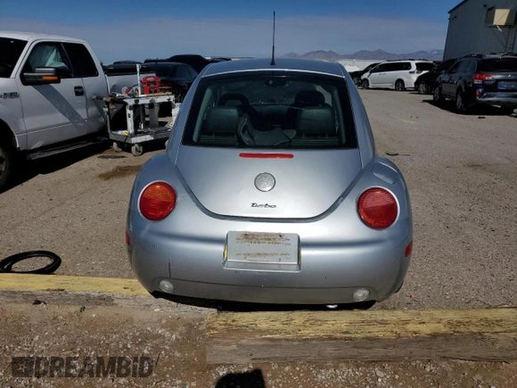 2004 Volkswagen Beetle with VIN 3VWCD31C94M412347, listed as a Copart auction lot 79516144 with 102,542 mi miles and Salvage Title. Bid and sale history available at DreamBid. Image 6.