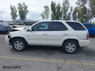 2004 Acura MDX Touring Pkg w/Navigation with VIN 2HNYD18834H520180, listed as a IAAI auction lot 41934124 with 201,817 mi miles. Bid and sale history available at carsss.com. Image 14.