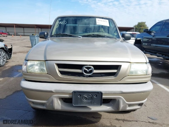 2002 Mazda B-Series 2WD Truck DS with VIN 4F4YR16U52TM18118, listed as a IAAI auction lot 41563022 with 126,136 mi miles. Bid and sale history available at carsss.com. Image 12.