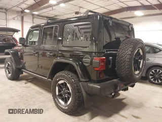 2021 Jeep Wrangler Unlimited Rubicon with VIN 1C4HJXFN2MW719135, listed as a IAAI auction lot 41835698 with 20,447 mi miles and . Bid and sale history available at DreamBid. Image 3.