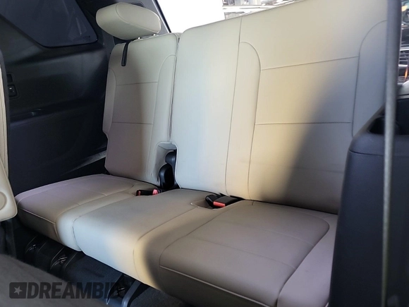 2022 Chevrolet Traverse LT with VIN 1GNERHKW7NJ177665, listed as a IAAI auction lot 42667314 with 103,830 mi miles and . Bid and sale history available at DreamBid. Image 6.