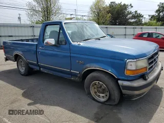 1995 Ford F-150 with VIN 1FTEF15H5SNB72572, listed as a Copart auction lot 52452315 with 303,554 mi miles and Salvage Title. Bid and sale history available at carsss.com. Image 4.