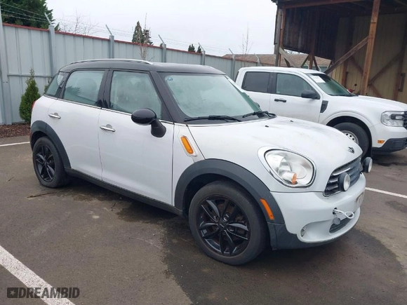 2011 MINI Cooper Countryman with VIN WMWZB3C54BWM01011, listed as a IAAI auction lot 41809669 with 1 mi miles. Bid and sale history available at carsss.com. Image 1.