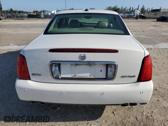 2004 Cadillac DeVille z VIN 1G6KD57Y14U149606, wystawiony jako Copart lot #51230955 z przebiegiem Nie podano mil oraz Szkoda całkowita • Salvage title. Historia ofert i sprzedaży dostępna na DreamBid. Obrazek 6.