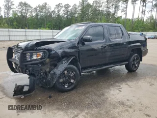 2012 Honda Ridgeline RTL z VIN 5FPYK1F5XCB459829, wystawiony jako Copart lot #53954185 z przebiegiem 221 935 mil mil oraz Szkoda całkowita • Salvage title. Historia ofert i sprzedaży dostępna na DreamBid. Obrazek 1.