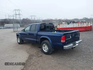 2003 Dodge Dakota SLT with VIN 1D7HL48X23S261258, listed as a IAAI auction lot 41362485 with 143,397 mi miles. Bid and sale history available at carsss.com. Image 3.