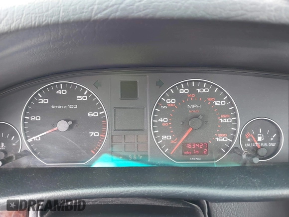 1996 Audi A6 z VIN WAUJA84A9TN106938, wystawiony jako IAAI lot #42287751 z przebiegiem 163 427 mil mil oraz . Historia ofert i sprzedaży dostępna na DreamBid. Obrazek 7.