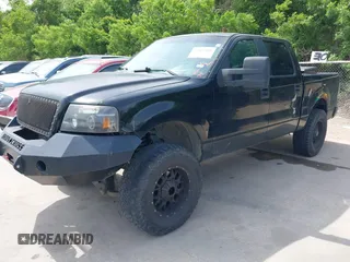 2005 Ford F-150 XLT with VIN 1FTRW12W85KF10850, listed as a IAAI auction lot 42066441 with 226,803 mi miles. Bid and sale history available at carsss.com. Image 2.