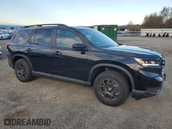 2023 Honda Pilot TrailSport with VIN 5FNYG1H63PB017335, listed as a Copart auction lot 75012154 with 5,870 mi miles and Salvage Title. Bid and sale history available at carsss.com. Image 4.