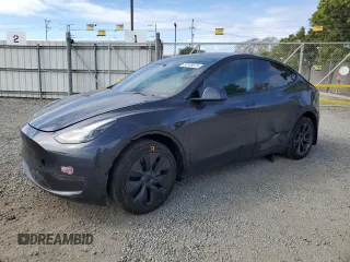 2024 Tesla Model Y z VIN 7SAYGDED7RF099743, wystawiony jako Copart lot #53165675 z przebiegiem 7 694 mil mil oraz Szkoda całkowita • Salvage title. Historia ofert i sprzedaży dostępna na DreamBid. Obrazek 1.