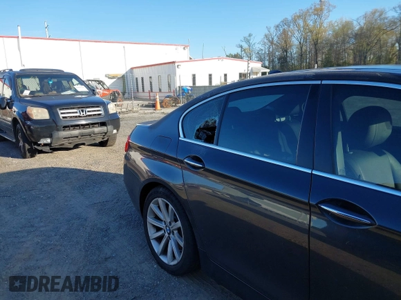2014 BMW 5 Series 535i xDrive with VIN WBA5B3C53ED539542, listed as a IAAI auction lot 41858938 with 118,335 mi miles and . Bid and sale history available at carsss.com. Image 6.