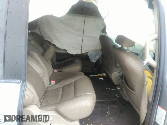 2015 Toyota Sienna XLE with VIN 5TDYK3DC0FS589947, listed as a IAAI auction lot 36567379 with 130,969 mi miles and . Bid and sale history available at DreamBid. Image 8.