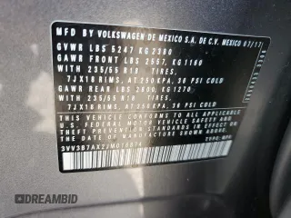 2018 Volkswagen Tiguan SEL z VIN 3VV3B7AX2JM016874, wystawiony jako Copart lot #54525515 z przebiegiem 87 472 mil mil oraz Nie do naprawy • Non repairable. Historia ofert i sprzedaży dostępna na DreamBid. Obrazek 13.