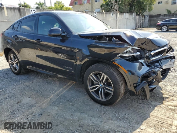 2015 BMW X6 xDrive50i with VIN 5UXKU6C50F0F94199, listed as a Copart auction lot 70680312 with 106,650 mi miles. Bid and sale history available at carsss.com. Image 4.