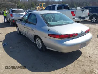 1999 Mercury Sable GS z VIN 1MEFM50U0XG609913, wystawiony jako IAAI lot #41783308 z przebiegiem 80 022 mil mil oraz . Historia ofert i sprzedaży dostępna na DreamBid. Obrazek 3.