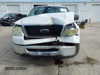 2006 Ford F-150 XL with VIN 1FTPX12VX6NB83220, listed as a IAAI auction lot 42001770 with 228,216 mi miles. Bid and sale history available at carsss.com. Image 13.