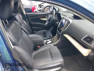 2022 Subaru Ascent Touring with VIN 4S4WMARD9N3400473, listed as a IAAI auction lot 42633365 with 42,019 mi miles and . Bid and sale history available at DreamBid. Image 5.
