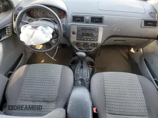 2007 Ford Focus SE with VIN 1FAFP36N87W183509, listed as a Copart auction lot 54649255 with 156,260 mi miles and Salvage title. Bid and sale history available at DreamBid. Image 8.