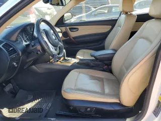 2013 BMW 1 Series 128i with VIN WBAUP7C54DVP24583, listed as a Copart auction lot 77454984 with 114,358 mi miles and Salvage Title. Bid and sale history available at carsss.com. Image 7.