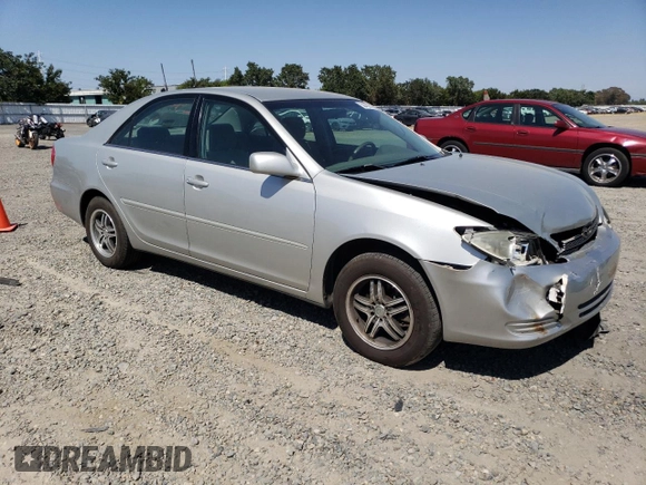 2002 Toyota Camry LE z VIN 4T1BE32KX2U037722, wystawiony jako Copart lot #58482805 z przebiegiem 154 207 mil mil oraz Szkoda całkowita • Salvage title. Historia ofert i sprzedaży dostępna na DreamBid. Obrazek 4.