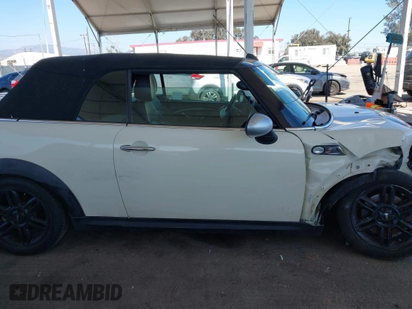 2014 MINI Convertible S with VIN WMWZP3C5XET706911, listed as a IAAI auction lot 42217410 with 54,649 mi miles and . Bid and sale history available at DreamBid. Image 13.