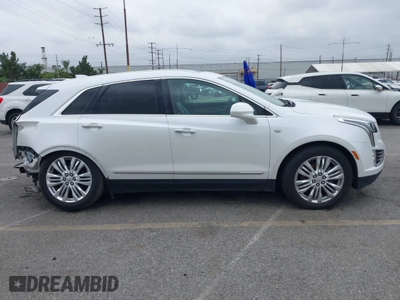 2017 Cadillac XT5 Premium Luxury FWD z VIN 1GYKNCRS3HZ307728, wystawiony jako IAAI lot #42203542 z przebiegiem 50 433 mil mil oraz . Historia ofert i sprzedaży dostępna na DreamBid. Obrazek 14.