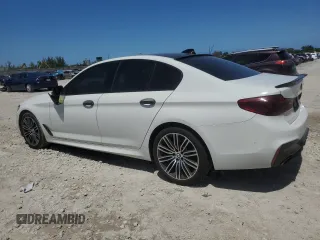 2018 BMW 5 Series 540i with VIN WBAJE5C58JWA96615, listed as a Copart auction lot 56117205 with 87,211 mi miles and Salvage title. Bid and sale history available at DreamBid. Image 2.