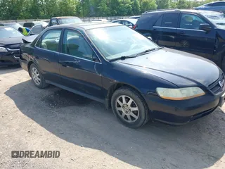 2002 Honda Accord SE z VIN 1HGCG56742A160536, wystawiony jako IAAI lot #42133683 z przebiegiem 304 322 mil mil oraz . Historia ofert i sprzedaży dostępna na DreamBid. Obrazek 1.