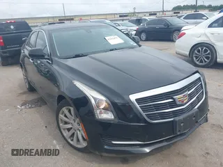 2017 Cadillac ATS RWD z VIN 1G6AA5RX1H0155721, wystawiony jako IAAI lot #42152475 z przebiegiem 69 410 mil mil oraz . Historia ofert i sprzedaży dostępna na DreamBid. Obrazek 1.