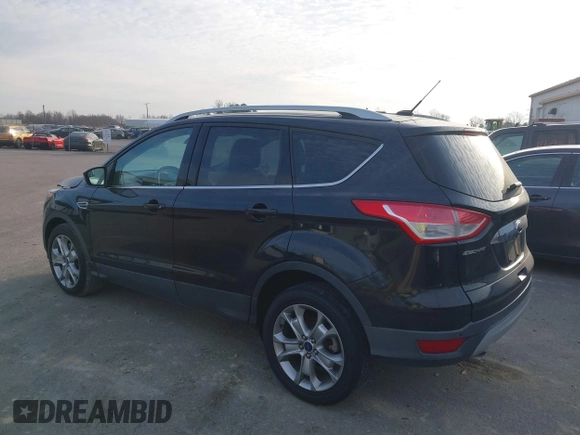 2015 Ford Escape Titanium with VIN 1FMCU0J98FUA19911, listed as a IAAI auction lot 41750596 with 106,706 mi miles. Bid and sale history available at carsss.com. Image 3.
