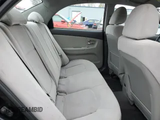 2009 Kia Spectra EX z VIN KNAFE222295664027, wystawiony jako Copart lot #50788635 z przebiegiem 118 563 mil mil oraz Czysty tytuł • Clean title. Historia ofert i sprzedaży dostępna na DreamBid. Obrazek 10.