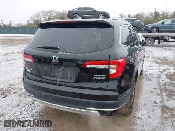 2021 Honda Pilot Touring 8-Passenger z VIN 5FNYF6H94MB091384, wystawiony jako IAAI lot #41567070 z przebiegiem 78 330 mil mil oraz . Historia ofert i sprzedaży dostępna na DreamBid. Obrazek 4.
