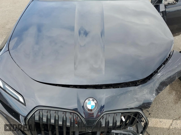 2024 BMW 7 Series 740i xDrive with VIN WBA33EH09RCR24113, listed as a Copart auction lot 56699365 with Not provided miles and Salvage title. Bid and sale history available at DreamBid. Image 11.