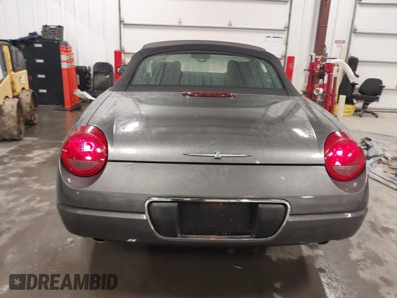 2003 Ford Thunderbird Deluxe z VIN 1FAHP60A53Y113819, wystawiony jako IAAI lot #41724732 z przebiegiem Nie podano mil oraz . Historia ofert i sprzedaży dostępna na DreamBid. Obrazek 17.