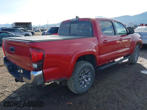 2018 Toyota Tacoma SR with VIN 3TMCZ5AN2JM134145, listed as a IAAI auction lot 41124645 with 61,302 mi miles. Bid and sale history available at carsss.com. Image 4.
