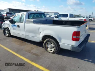 2007 Ford F-150 XL with VIN 1FTRF12W17NA26892, listed as a IAAI auction lot 41011688 with 158,088 mi miles. Bid and sale history available at carsss.com. Image 3.