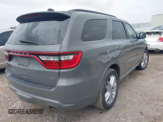2023 Dodge Durango R/T Plus z VIN 1C4SDHCT9PC553174, wystawiony jako IAAI lot #42635197 z przebiegiem 51 121 mil mil oraz . Historia ofert i sprzedaży dostępna na DreamBid. Obrazek 4.
