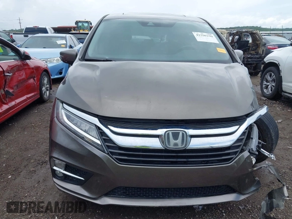2019 Honda Odyssey Touring with VIN 5FNRL6H81KB038790, listed as a IAAI auction lot 42200190 with 131,761 mi miles and . Bid and sale history available at DreamBid. Image 13.