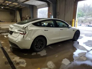 2025 Tesla Model 3 Long Range z VIN 5YJ3E1EBXSF942561, wystawiony jako Copart lot #52961935 z przebiegiem 5 911 mil mil oraz Szkoda całkowita • Salvage title. Historia ofert i sprzedaży dostępna na DreamBid. Obrazek 3.