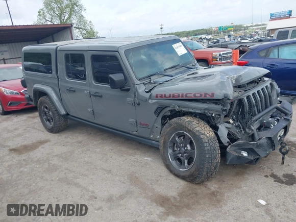 2021 Jeep Gladiator Rubicon with VIN 1C6JJTBG8ML619972, listed as a IAAI auction lot 42057805 with 37,875 mi miles and . Bid and sale history available at DreamBid. Image 1.