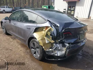 2023 Tesla Model 3 with VIN 5YJ3E1EA6PF567170, listed as a IAAI auction lot 41837040 with 36,193 mi miles and . Bid and sale history available at DreamBid. Image 6.