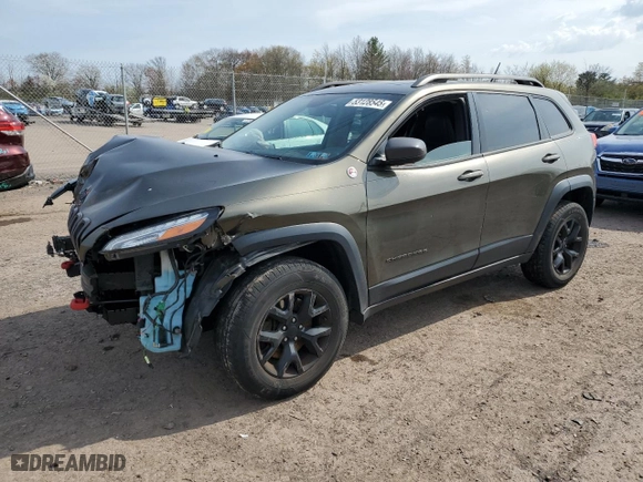 2015 Jeep Cherokee Trailhawk with VIN 1C4PJMBSXFW687205, listed as a Copart auction lot 53128545 with 86,876 mi miles and Salvage Title. Bid and sale history available at carsss.com. Image 1.