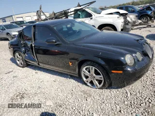 2005 Jaguar S-Type with VIN SAJWA03V251N28012, listed as a Copart auction lot 74417644 with 128,947 mi miles and Salvage Title. Bid and sale history available at DreamBid. Image 4.