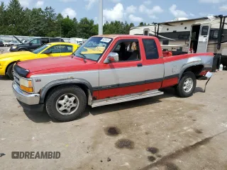 1995 Dodge Dakota z VIN 1B7GL23YXSS155861, wystawiony jako Copart lot #64209414 z przebiegiem 336 037 mil mil oraz Szkoda całkowita • Salvage title. Historia ofert i sprzedaży dostępna na DreamBid. Obrazek 1.