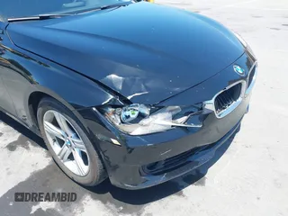 2013 BMW 3 Series 328i with VIN WBA3C1C5XDF440969, listed as a IAAI auction lot 42484169 with 150,791 mi miles and . Bid and sale history available at DreamBid. Image 6.