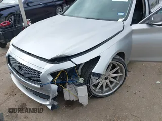2014 Infiniti Q50 with VIN JN1BV7AP0EM681679, listed as a IAAI auction lot 41371773 with 141,940 mi miles. Bid and sale history available at carsss.com. Image 6.