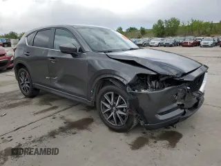 2018 Mazda CX-5 Touring z VIN JM3KFBCM4J0349687, wystawiony jako Copart lot #55857945 z przebiegiem Nie podano mil oraz Szkoda całkowita • Salvage title. Historia ofert i sprzedaży dostępna na DreamBid. Obrazek 4.
