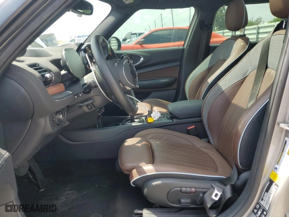 2024 MINI Clubman Cooper S with VIN WMWXJ1C01R2V12216, listed as a Copart auction lot 68257044 with 7,339 mi miles and Salvage Title. Bid and sale history available at carsss.com. Image 7.