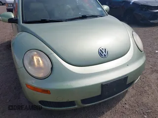 2007 Volkswagen New Beetle Coupe with VIN 3VWPW31C67M521767, listed as a IAAI auction lot 41687893 with 148,312 mi miles. Bid and sale history available at carsss.com. Image 6.
